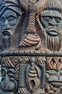 Hand carved wooden statues im the center of Noumea