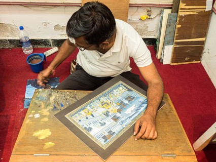 Artist creates traditional miniature painting