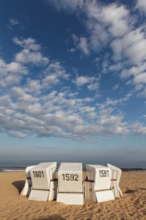 White beach chairs in the morning light