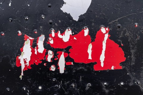 Remains of paint and rivets