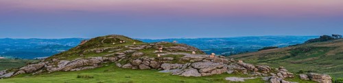 Sunset over fields in Haytor Rocks