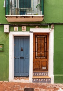 Close-up of doors of green fishermen's house in Villajoyosa