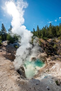 Hot steaming spring with blue water