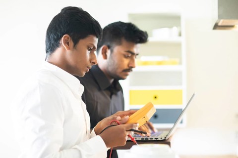 Students in an internship at the university with work equipment