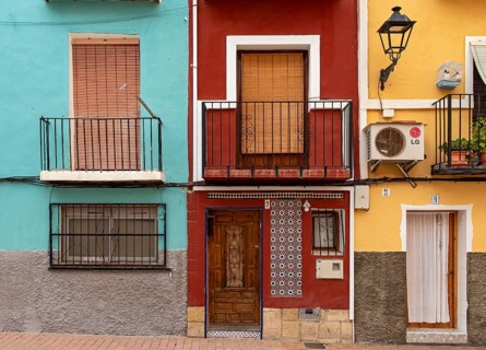 Close-up of colorful windows and doors of fishermen's houses in Villajoyosa