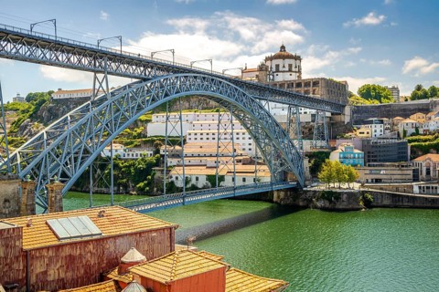 Beautiful iron Dom Luis I bridge over Douro river in Porto