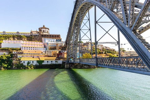 Beautiful iron Dom Luis I bridge over Douro river in Porto