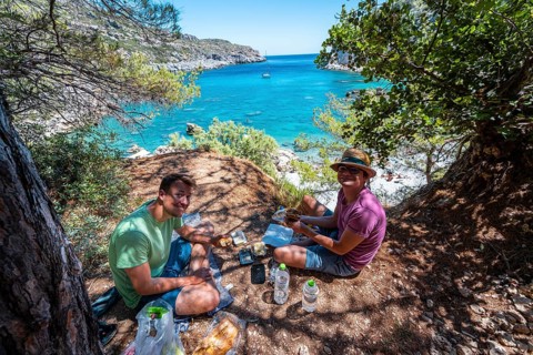 Two young men having a picnic