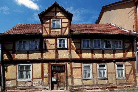 A dilapidated half-timbered house