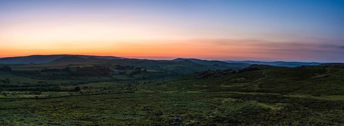 Sunset over fields in Haytor Rocks