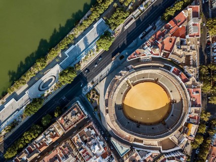 Bullring of the Real Maestranza de Caballeria surrounded by white architecture in Sevilla