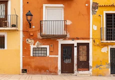 Close-up of colorful windows and doors of fishermen's houses in Villajoyosa