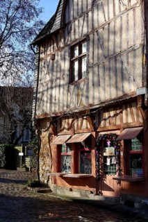 Half-timbered house Maison Aux Quatres Pignonsan the Place du Chatel