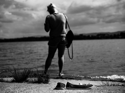 Women espadrilles on the lakeside