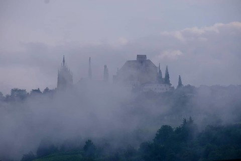 Clouds and fog around the Mausoleum and Parish Church of the Assumption of the Virgin Mary