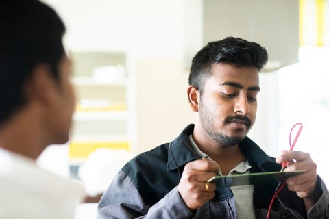 Students in an internship at the university with work equipment