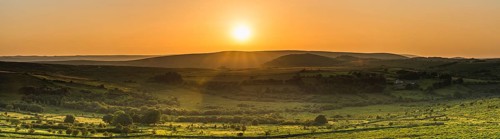 Sunset over fields in Haytor Rocks