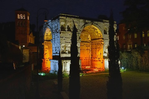 Illuminated Arch of Janus at night