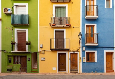 Close-up of colorful windows and doors of fishermen's houses in Villajoyosa