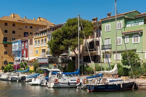 Yachts and colorful houses