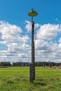 Barbed-wire fence and lamp-post at Auschwitz II-Birkenau concentration camp