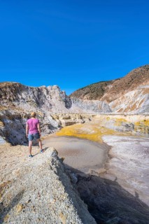 Young tourist at a crater