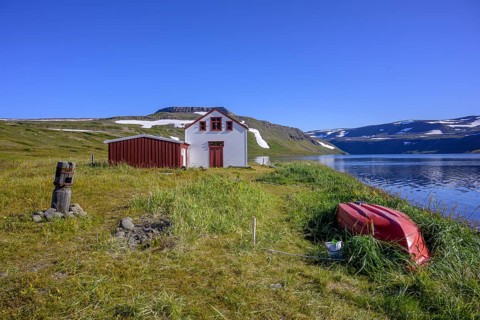 Rowing boat and old dwelling house