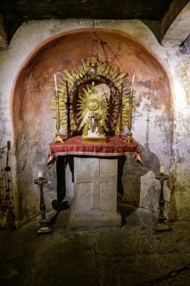 Altar in Crypta of Pope Adrian I in ancient cellar of Church of Santa Maria in Cosmedin