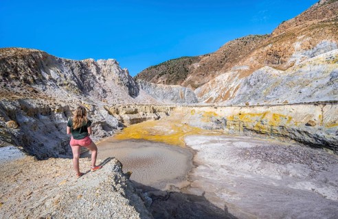 Young tourist at a crater