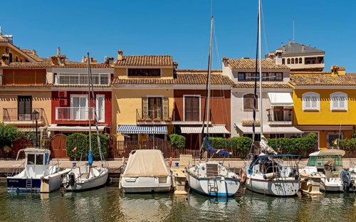 Yachts and colorful houses