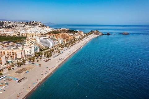Aerial view of touristic coast in Almunecar by Mediterranean Sea