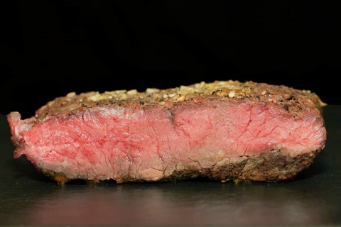 Medium roasted beef roast beef in pepper garlic coating