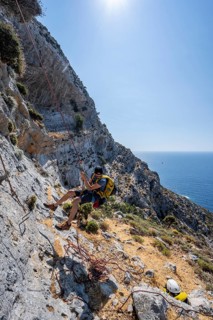Climbing a rock face