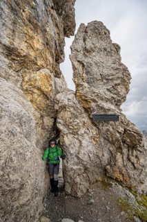 Hiker in a rock hole