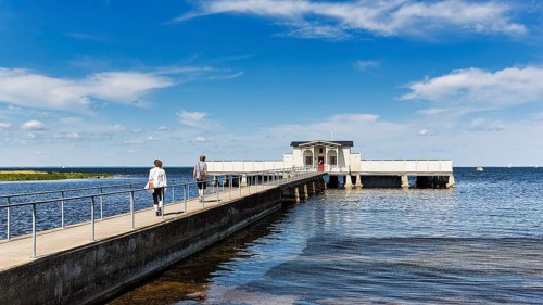 White cold bathhouse by the Baltic Sea