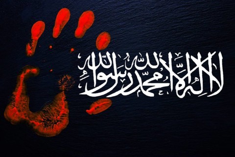Slate with a bloody handprint and the flag of the Taliban with the inscription