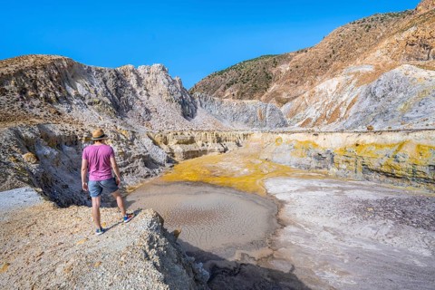 Young tourist at a crater