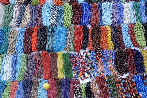 Colourful beads sale on a platform at Mylapore