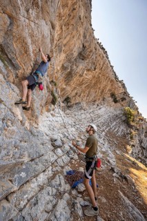 Climbing a rock face