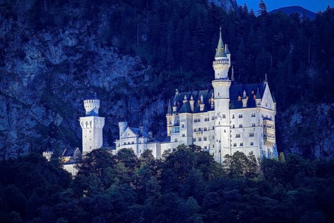 Illuminated Neuschwanstein Castle at night