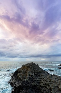 Coast with basalt columns in the evening