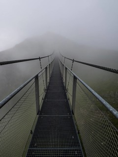 Suspension bridge in the fog
