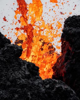 Erupting volcano with lava