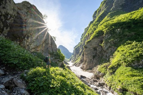 Hikers by a stream