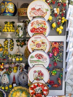 Colourfully painted pizza plates