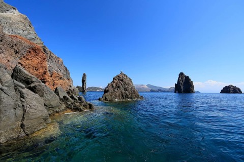 Rocks jutting out of the sea Faraglioni di Lipari at the southern tip of Lipari