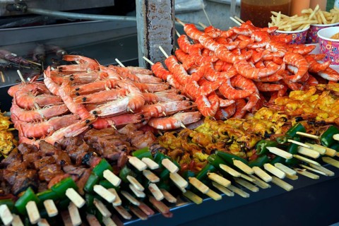 Various skewers with meat and seafood