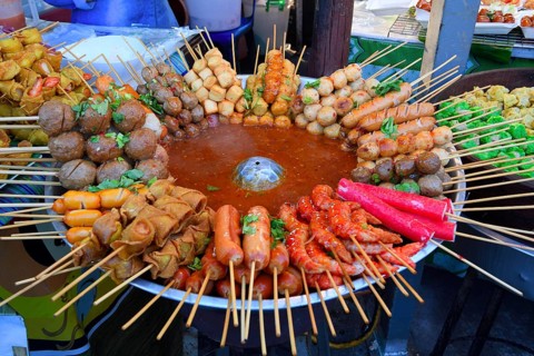 Various skewers with meat and seafood