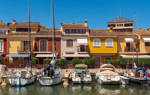 Yachts and colorful houses