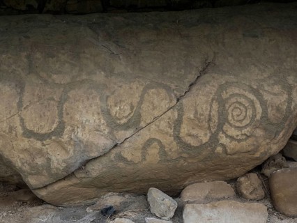 Rock engraving on Neolithic passage grave